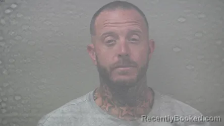 Mugshot of JASON MICHAEL HURKMANS booked in Dickinson County, Michigan on July 9, 2026