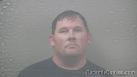 Mugshot of AARON SCOTT MIILU booked in Dickinson County, Michigan on July 24, 2026