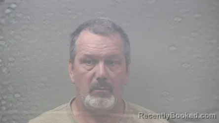 Mugshot of DOUGLAS ALLEN MATCHETT booked in Dickinson County, Michigan on July 25, 2026
