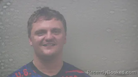 Mugshot of RILEY ARCHER JOHNSON booked in Dickinson County, Michigan on July 28, 2026