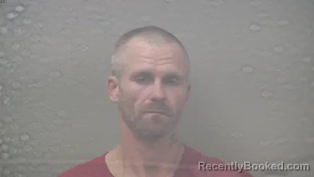 Mugshot of MICHAEL ALLEN KER booked in Dickinson County, Michigan on July 30, 2026