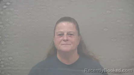 Mugshot of SUZANNE RAYE SCOTT booked in Dickinson County, Michigan on July 30, 2026