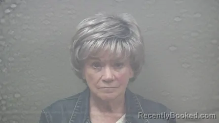 Mugshot of KATHRYN ANN ABRAHAM-COFFMAN booked in Dickinson County, Michigan on August 1, 2026