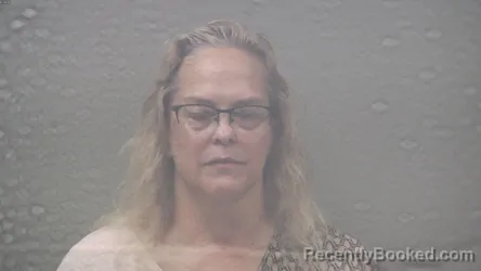 Mugshot of CATHY MARIE RIETVELD booked in Dickinson County, Michigan on August 4, 2026