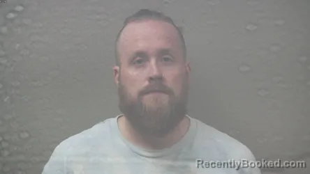 Mugshot of Michael Ryan St John booked in Dickinson County, Michigan on August 19, 2026