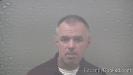 Mugshot of Bryan Otto Gussert booked in Dickinson County, Michigan on August 20, 2026