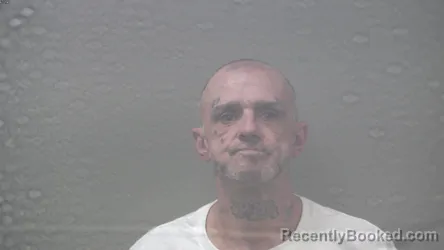 Mugshot of Michael Anthony Graves booked in Dickinson County, Michigan on August 25, 2026