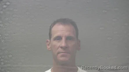 Mugshot of Bradley Alan Trulock booked in Dickinson County, Michigan on August 28, 2026
