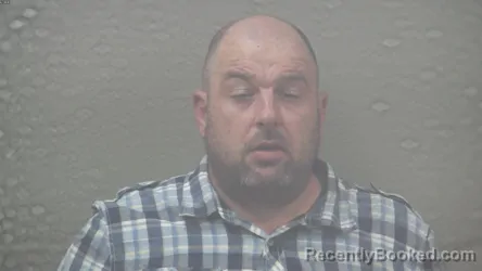 Mugshot of Justin Arnold Siedlecki booked in Dickinson County, Michigan on October 19, 2026
