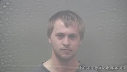 Mugshot of Samuel Gordon Kuchinski booked in Dickinson County, Michigan on October 24, 2026