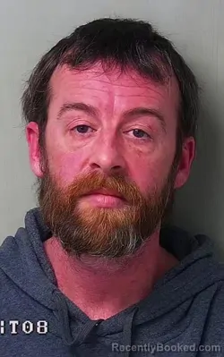 Mugshot of Thomas Ely Huff