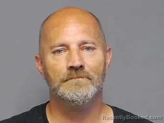 Mugshot of Brandon Ryan Hamm booked in Houghton County, Michigan on August 21, 2026