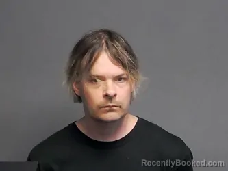 Mugshot of JASON THOMAS JUNTIKKA booked in Houghton County, Michigan on June 9, 2026