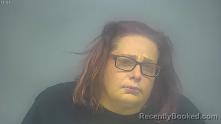 Mugshot of MICHELLE LYNN MOORE booked in Isabella County, Michigan on April 30, 2026