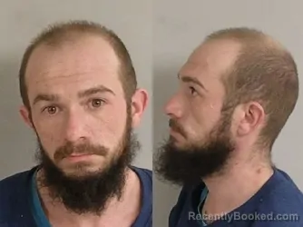 Mugshot of DANIEL Raymond III Deladurantaye