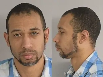 Mugshot of Dominic Rene Michel booked in Jackson County, Michigan on July 22, 2026