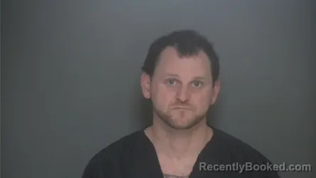 Mugshot of KEVIN MANCOUR