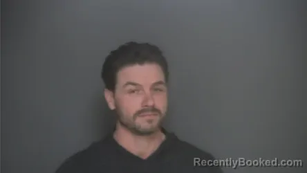 Mugshot of JARED BRUSS