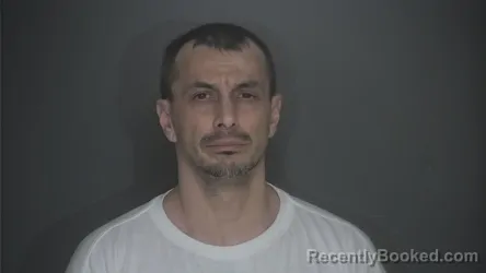 Mugshot of ROSS MULLINS booked in Lapeer County, Michigan on May 18, 2026