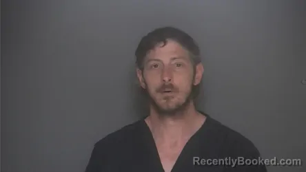 Mugshot of JUSTIN HENDERSON booked in Lapeer County, Michigan on July 7, 2026