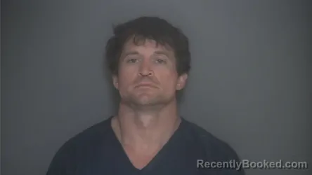 Mugshot of Justin Ernst booked in Lapeer County, Michigan on August 16, 2026