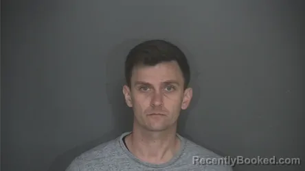 Mugshot of Charles Pass booked in Lapeer County, Michigan on August 27, 2026