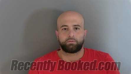 Booking photo from Macomb County, Michigan