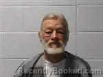 Mugshot of John Victor Russell booked in Polk County, North Carolina on March 19, 2026