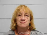 Mugshot of Kimberly Ann Russell booked in Polk County, North Carolina on March 23, 2026