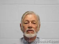 Mugshot of John Victor Russell booked in Polk County, North Carolina on April 20, 2026