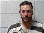 Mugshot of Christopher Allen Stonesifer booked in Polk County, North Carolina on April 27, 2026