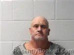 Mugshot of Adam Dewayne Hutchins booked in Polk County, North Carolina on July 8, 2026
