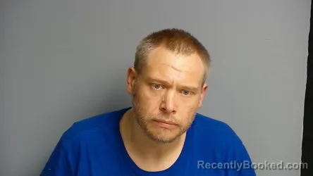 Mugshot of ROBERT ANTHONY-WOLEVER NEWCOM booked in Manistee County, Michigan on June 24, 2026