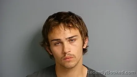 Mugshot of Adrian Lee Carlock booked in Manistee County, Michigan on August 25, 2026