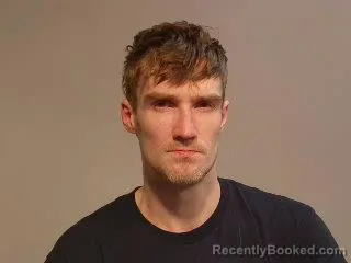 Mugshot of Dustin Ty Kunick