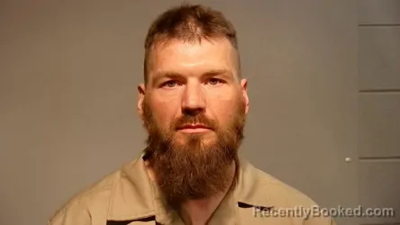 Mugshot of Justin Andrew Sarnowski