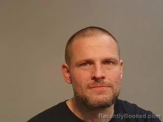 Mugshot of Damien Kristopher Racine