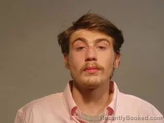 Mugshot of Evann Michael Esterline booked in Marquette County, Michigan on April 17, 2026