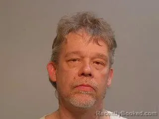 Mugshot of John William SR. Abbott booked in Marquette County, Michigan on April 24, 2026