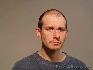Mugshot of Kirk William-Floyd Bragenzer booked in Marquette County, Michigan on May 12, 2026