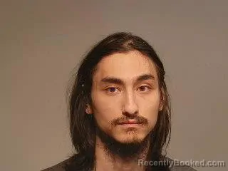 Mugshot of Elijah Khoury Kim booked in Marquette County, Michigan on June 2, 2026