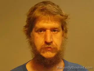 Mugshot of Austin Paul Johnson-Campbell booked in Marquette County, Michigan on June 19, 2026