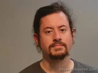 Mugshot of Erik Martin Robinson booked in Marquette County, Michigan on July 13, 2026