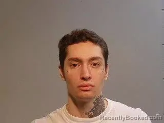 Mugshot of Tyler Blaine Miller booked in Marquette County, Michigan on August 4, 2026
