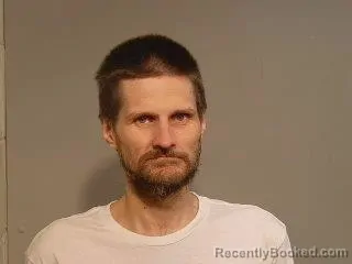 Mugshot of Bryan Leslie Bjorne booked in Marquette County, Michigan on August 13, 2026