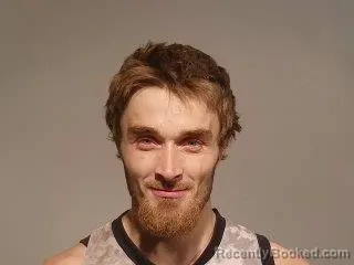 Mugshot of Adam John Dollar booked in Marquette County, Michigan on August 29, 2026