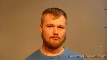 Mugshot of Bailey Joe Aho-Carello booked in Marquette County, Michigan on October 19, 2026