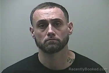 Mugshot of JUSTIN JAMES-DEAN GLOVER booked in Midland County, Michigan on May 4, 2026