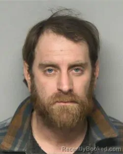 Mugshot of JUSTIN MATTHEW SANTIAGO