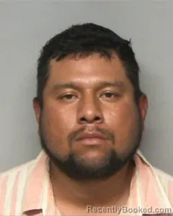 Mugshot of CARLOS ANTONIO DOMINGUEZ-CANELA booked in Randolph County, North Carolina on April 5, 2026